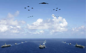 Warship With Air Support Jets Wallpaper