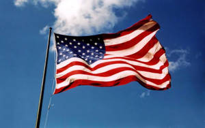 Waving American Flag In Pole Wallpaper