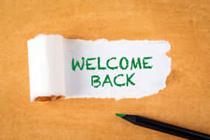 Welcome Back Message Torn Paper Wallpaper