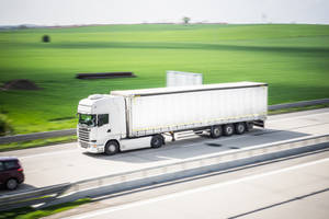 White Cool Truck In Highway Wallpaper