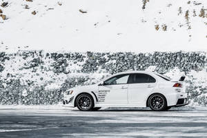 White Mitsubishi Lancer Snow Wallpaper