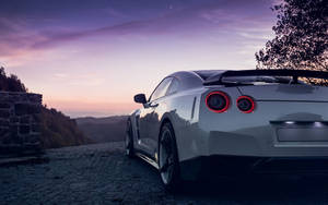 White Nissan Gtr Car Under Purple Sky Wallpaper