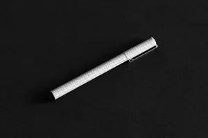 White Patterned Penon Black Background Wallpaper