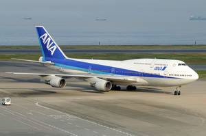 White Van And Ana Airplane Wallpaper