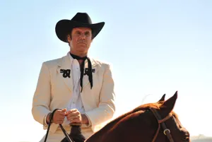 Will Ferrell Striking A Comical Pose Wallpaper