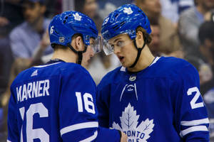 William Nylander And Mitch Marner In High Spirits On The Ice Wallpaper