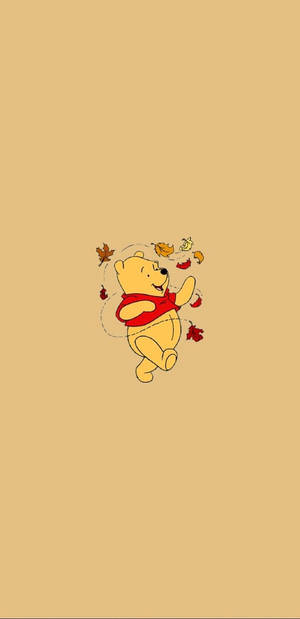 Winnie The Pooh With Leaves Wallpaper