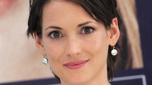 Winona Ryder Wearing Pearl Earrings Wallpaper