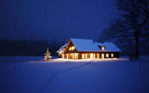 Winter Night Desktop With A Festive House Wallpaper