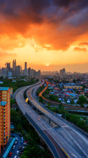 Witness A Beautiful Sunset In The City Wallpaper