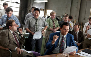 Wolf Of Wall Street Leonardo With Colleagues Wallpaper