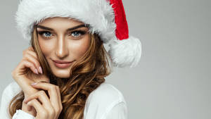 Woman Face Santa Claus Hat Wallpaper