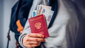 Woman Holding Russian Passport And Banknote Wallpaper