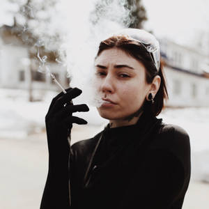 Woman In Black Smoking Wallpaper