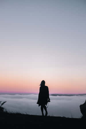 Woman Silhouette On Mountain Wallpaper
