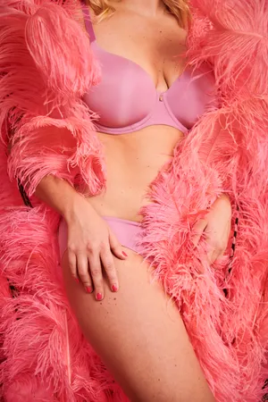 Woman Wearing Pink In Sexy Pose Wallpaper