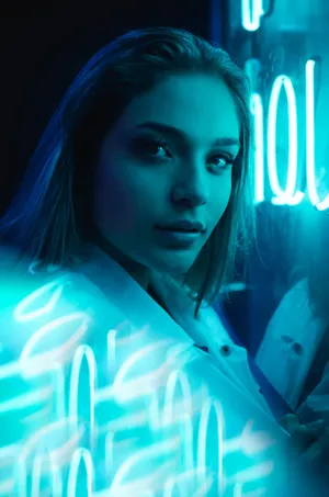 Woman With Glowing Neon Blue Iphone Wallpaper