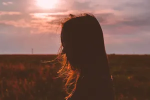 Woman’s Outline Against The Sun Profile Wallpaper