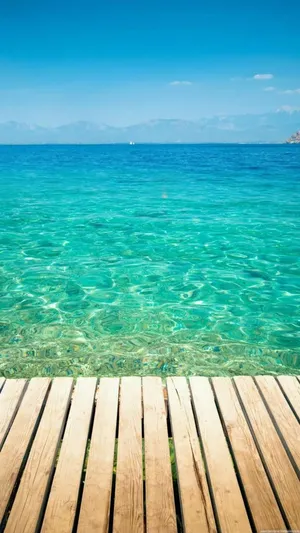 Wooden Dock On Beach Iphone Wallpaper