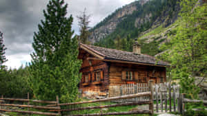 Wooden Log Cabin In Nature Wallpaper