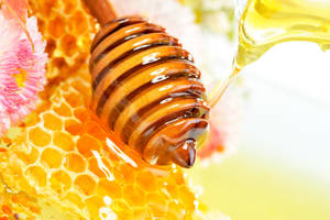 Wooden Utensil For Honey Wallpaper