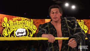 Wwe Legend William Regal In His Signature Pose In Wwe 2k22 Wallpaper