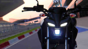 Yamaha Motorcycle Headlight Racetrack Background Wallpaper