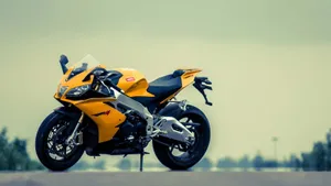 Yellow Aprilia Rsv4 Motor Bike Wallpaper