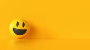 Yellow Ball With Happy Smile Wallpaper