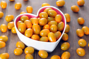 Yellow Grape Tomato Fruits On Bowl Wallpaper