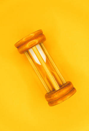 Yellow Hour Glass Clock Wallpaper