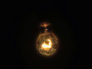 Yellow Lit Light Bulb Wallpaper