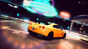 Yellow Nissan Gtr Sports Car In Motion Blur Wallpaper