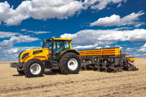 Yellow Valtra Hitech 4 Tractor Wallpaper