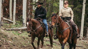 Yellowstone Tv Show Rip With Ranger Wallpaper