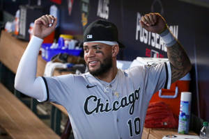 Yoan Moncada Smiling With Arms Up Wallpaper