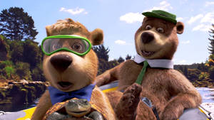 Yogi Bear Enjoying Water Rafting Adventure Wallpaper