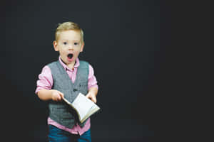 Young Boy Surprised Acting Wallpaper