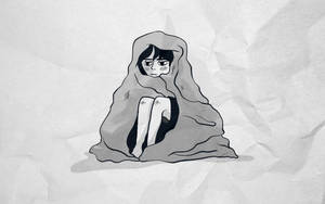 Young Woman Feeling Anxious Wrapped In Blanket Wallpaper