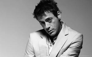 Youthful Pose Robert Downey Jr. Wallpaper