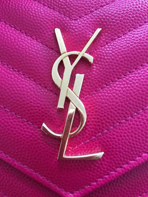 Ysl Logo In Pink Purse Wallpaper