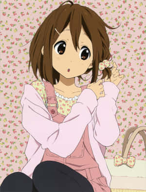 Yui Hirasawa Striking A Charming Pose Wallpaper