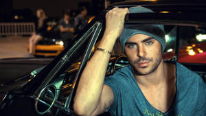 Zac Efron In Car Wallpaper