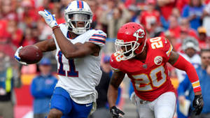 Zay Jones Running From Opposing Player Wallpaper