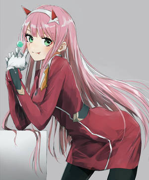 Zero Two Holding Green Lollipop Wallpaper