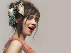 Zooey Deschanel In Cute Ribbon Wallpaper