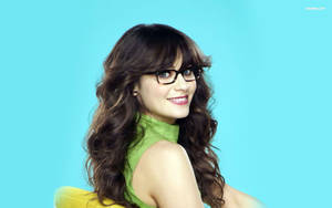 Zooey Deschanel In Glasses Blue Aesthetic Wallpaper